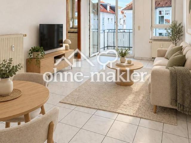 Helle 2 Zimmer Wohnung mit Einbauküche, Balkon und Tiefgaragenstellplatz