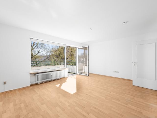 Helle 2 Zimmer Wohnung mit Südbalkon und Tiefgaragenstellplatz – sofort bezugsfrei