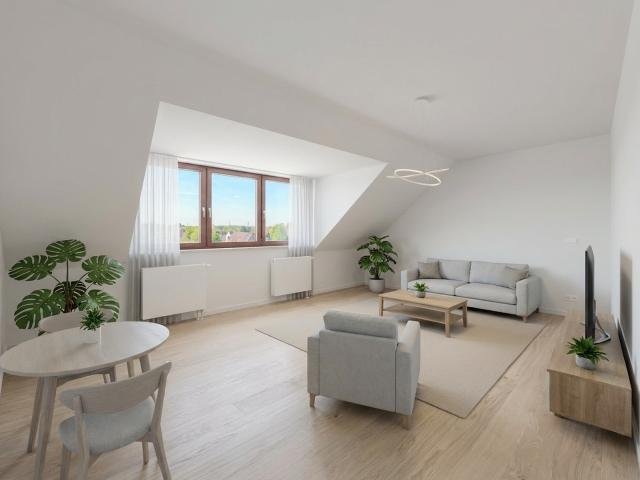 Helle 2 Zimmer Dachgeschosswohnung mit besonderem Charme