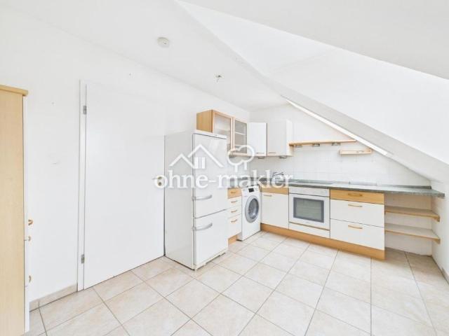 Helle 2 Zimmer Dachgeschosswohnung mit Südbalkon und Tiefgarage in Ebersberg