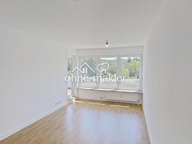 Helle 2 Zimmer Erdgeschosswohnung mit Wannenbad & Balkon