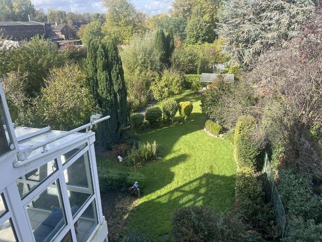 Helle 2 Zimmer Erdgeschosswohnung mit Wintergarten, Gartenblick und Stellplatz