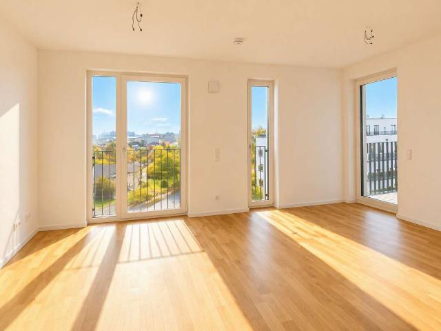 Helle 2 Zimmer Neubauwohnung mit Südost Balkon, Fernblick und Einbauküche
