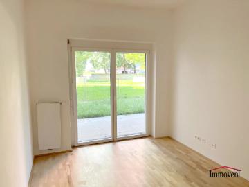 Helle 2 Zimmerwohnung mit Terrasse und Gartenanteil!