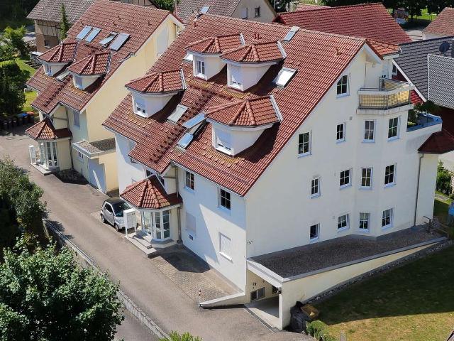Helle 2,5 Zimmer Wohnung 64 m² mit Südwest Balkon und TG Stellplatz in ruhiger Lage