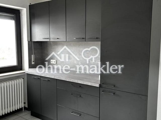 Helle 3 Zimmer Dachgeschosswohnung mit Balkon