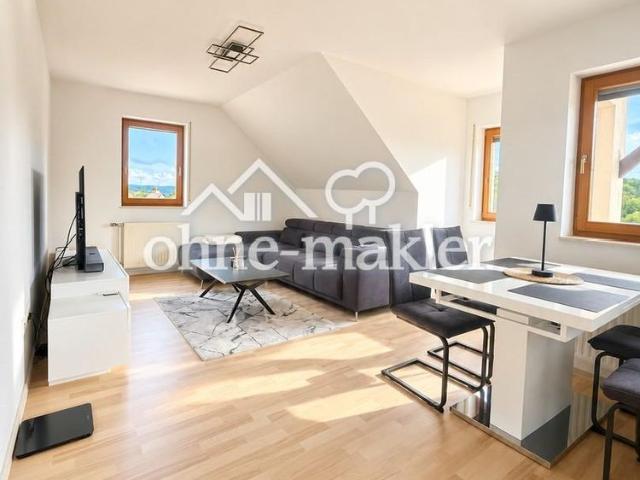 Helle 3 Zimmer Dachgeschosswohnung mit Balkon, Einbauküche und Garage in Krautheim
