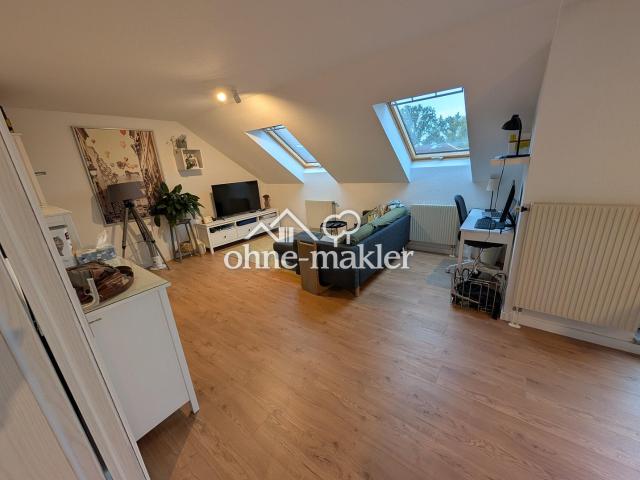 Helle 3 Zimmer Dachgeschosswohnung mit Südwest Terrasse, Einbauküche und Blick zur Boselspitze