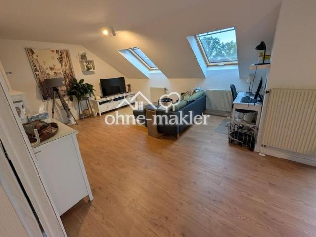 Helle 3 Zimmer Dachgeschosswohnung mit Südwest Terrasse, Einbauküche und Blick zur Boselspitze