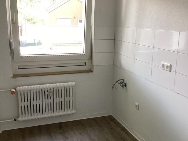 Helle 3 Zimmerwohnung mit Balkon im Hochparterre