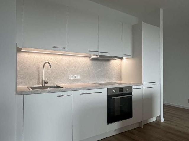 Helle 3 Zimmerwohnung mit EBK, Fußbodenheizung und Balkon