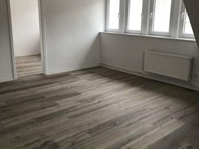 Helle und gepflegte 3,5 Zimmerwohnung mit Balkon, EBK und Garten