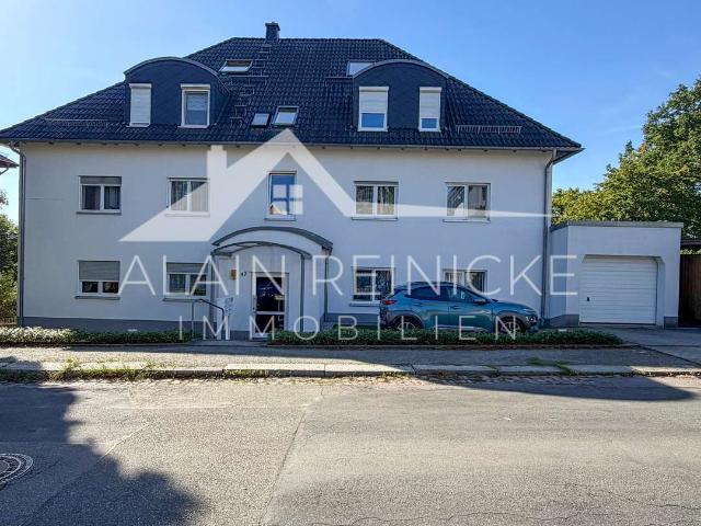 helle Wohnung mit Terrasse und Gartenanteil