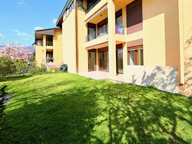 Helle Wohnung mit privatem Garten in Cureglia