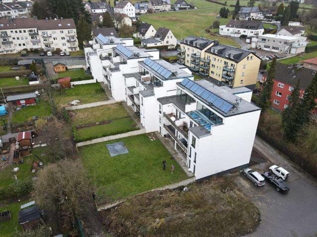 Helle Dachgeschosswohnung mit Terrasse, moderner Ausstattung und schönem Ausblick