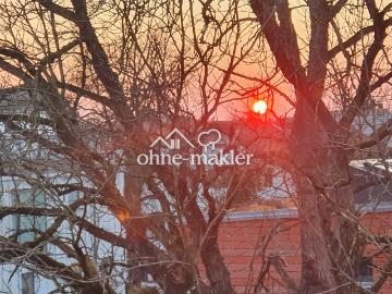 Helle Dachgeschosswohnung mit großer Dachterrasse und Blick ins Grüne