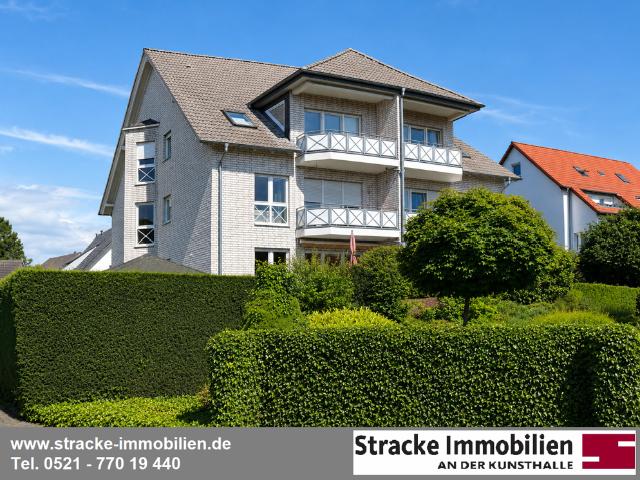 Helle Dachgeschosswohnung mit Sonnenbalkon und Weitblick