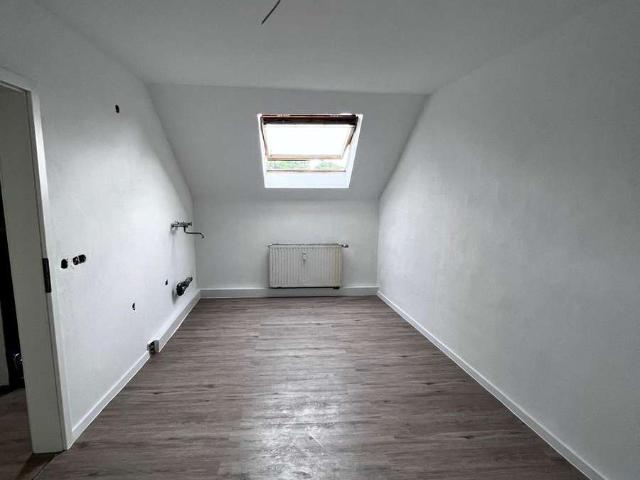 Helle Dachgeschosswohnung in zentraler Lage von Wuppertal!