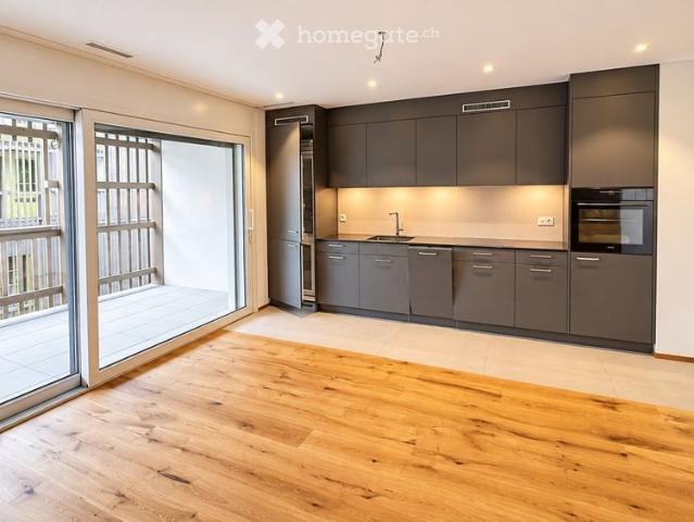 Helle Dachwohnung mit modernem Ausbau und charmanten Holzdetails