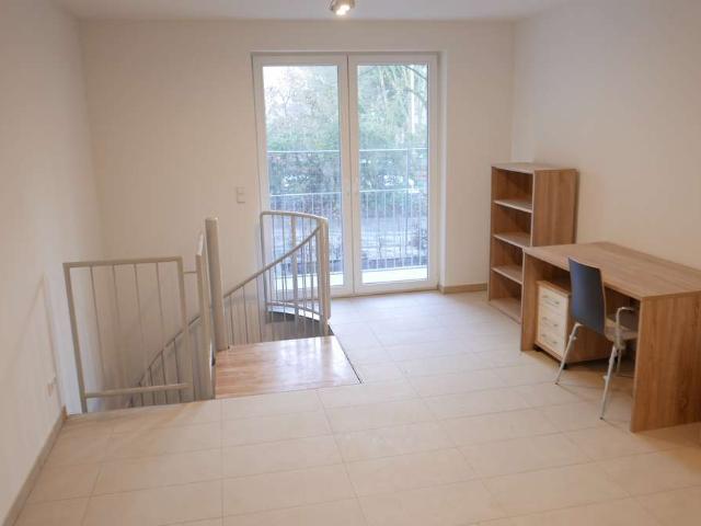 Helle Maisonettewohnung mit Balkon, TG und Abstellraum