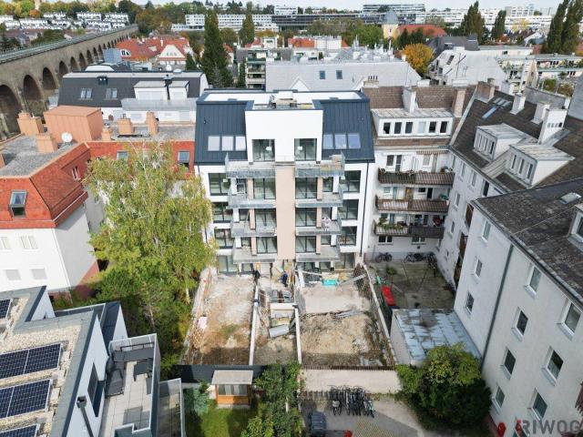 Heller Erstbezug | Hofseitige 2 Zimmerwohnung mit Balkon | Luftwärmepumpe | nähe Liesing & Riverside