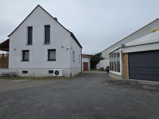 Hervorragendes und Renditestarkes Anwesen mit Einfamilienhaus und Gewerbeeinheit in Toplage