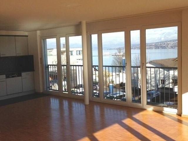 Her new apartment with a view of the lake