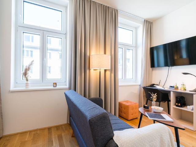 Heritage Meets Business: Sophisticated Apartment in a Historic Vienna Gem, Vienna Amsterdam Apartments for Rent