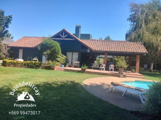 Hermosa casa con piscina en loteo la Reina, Talca