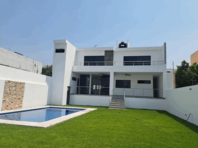 HERMOSA CASA NUEVA MINIMALISTA CON ALBERCA, JARDIN, 5 RECAMARAS 7 BAÑOS. VIGILANCIA