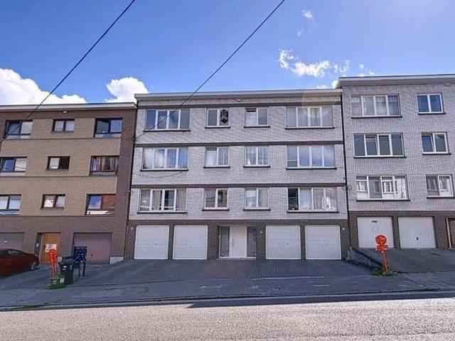 HEUSY: Appartement 1 chambre avec bureau/dressing et garage