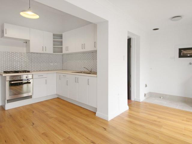 Hidden Gem Behind the Shops Beautifully Renovated & Surprisingly Spacious!