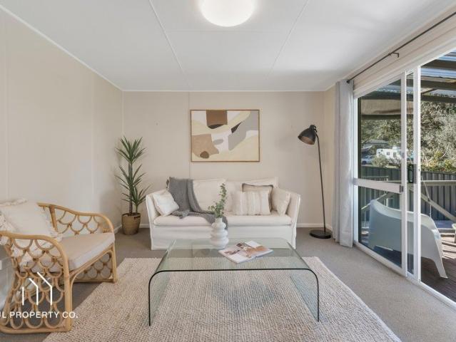 Hidden Gem with Valuable Rear Lane Access