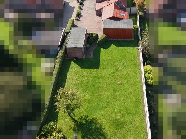 Hier steckt mehr drin! Ein Zuhause voller Möglichkeiten mit großem Garten mitten in Hooksiel!