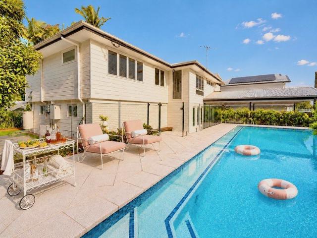 High on Lota Hill | Fully Renovated with a Self Contained Retreat and North Facing Pool