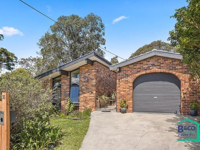 High Ceilings, Quality Brick Home and a Private Backyard Retreat