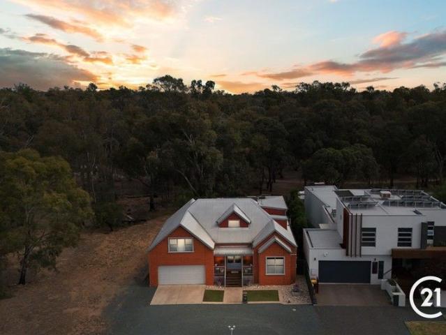 RARELY FOUND: MINUTES TO TOWN, SURROUNDED BY BUSH!