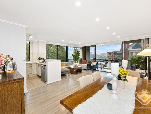 High level spacious and bright two bedroom apartment with floorboards