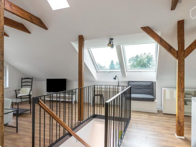High quality and fully furnished attic apartment in historic house