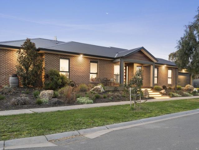 High quality low maintenance home with pool and shed!