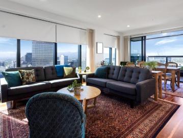 High Rise Elegance with Sweeping Hills to Coast Views