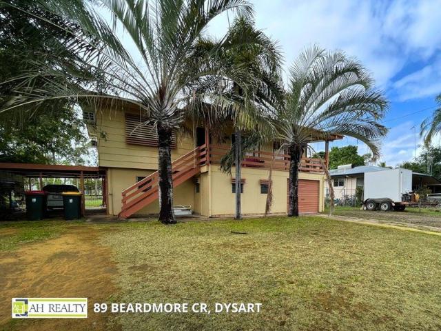 HIGH SET HOME WITH A DECK ON A HUGE BLOCK! EXCELLENT LOCATION!