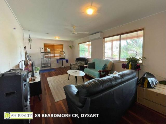 HIGH SET HOME WITH A DECK ON A HUGE BLOCK! EXCELLENT LOCATION!