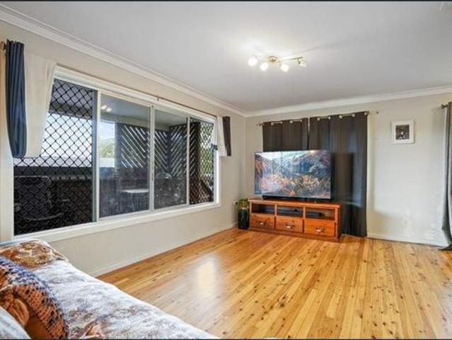 High Set Home with Modern Updates and Air Conditioning