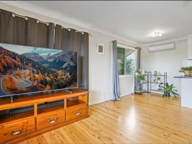 High Set Home with Modern Updates and Air Conditioning