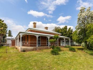 FOUR RESIDENCES WITH LONG TERM LEASE IN PLACE