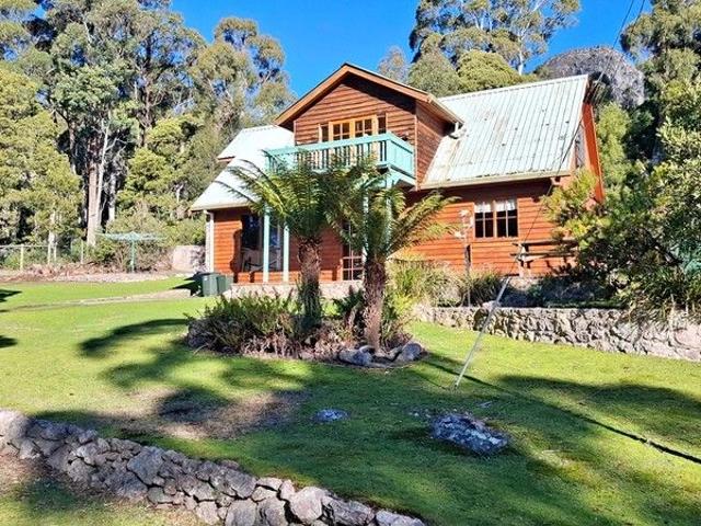 UNDER CONTRACT Highland Wonderland Timber and Stone