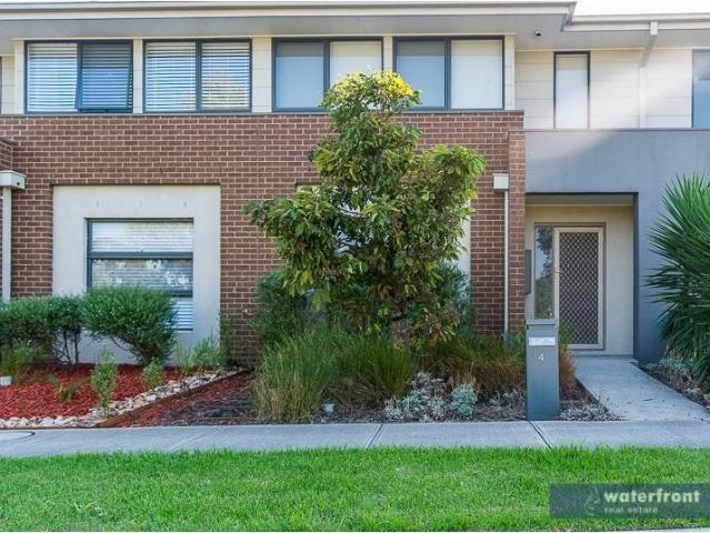 HIGHLY SOUGHT AFTER LAKE FRONT LOCATION & LOW MAINTENANCE LIVING