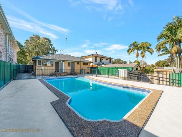 HIGHLY SOUGHT AFTER LOCATION FAMILY HOME WITH IN GROUND POOL