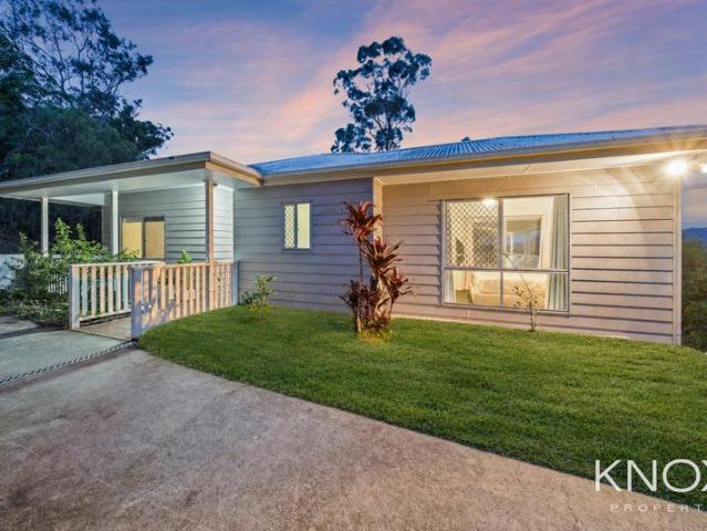HILLTOP QUEENSLANDER ELEGANCE ON A RARE 2,258m² ESTATE